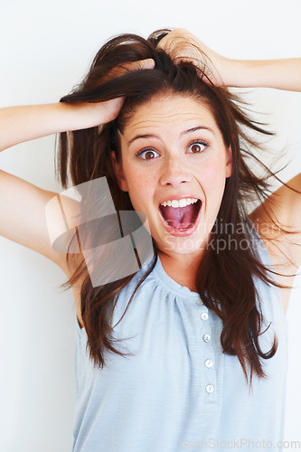 Image of Portrait, surprise and woman touching her hair in studio isolated on a white background. Wow, omg and face of female person with surprised expression, emoji and good news, announcement and shocked.