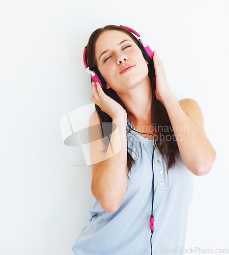 Image of Music headphones, relax or woman listening to girl song, wellness audio podcast or radio sound. Calm studio, freedom peace or gen z model streaming mental health playlist isolated on white background