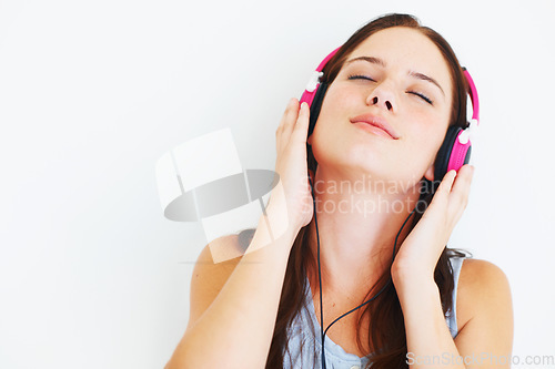 Image of Music headphones, wellness and woman listening to calm song, relax audio podcast or radio sound. Studio mockup, freedom peace and model streaming mental health playlist isolated on white background