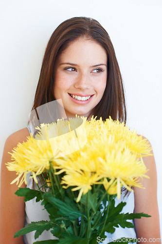 Image of Flower bouquet, face smile or studio woman with floral product, sustainable gift or yellow spring present. Nature growth, happy organic beauty and eco friendly model girl isolated on white background