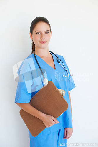 Image of Studio portrait, smile and nurse with clipboard checklist for nursing, medical healthcare or cardiology health. Medicine doctor, caregiver woman or happy hospital surgeon isolated on white background