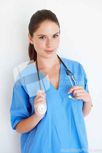 Image of Health portrait, stethoscope and studio caregiver ready for nursing career, medical healthcare or cardiology. Medicine doctor, nurse woman or hospital nurse with smile isolated on white background