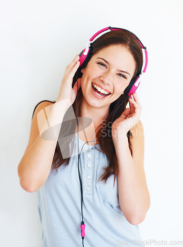 Image of Music headphones, smile and woman portrait listening to fun girl song, wellness audio podcast or radio sound. Happy, studio freedom and gen z model streaming edm playlist isolated on white background