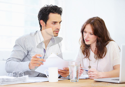 Image of Laptop, documents and business people planning, teamwork ideas and online collaboration in office meeting. Woman, man or partner with job paperwork, project solution and problem solving on computer