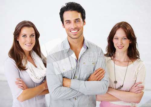 Image of Portrait, group and business people with arms crossed for leadership in office workplace together. Smile, friends and employees standing with confidence, teamwork and collaboration in company.