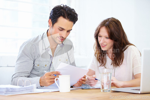 Image of Documents, planning and business people or partner in meeting collaboration, teamwork or financial review. Startup man and woman with paperwork talking, feedback or advice on finance, taxes or profit