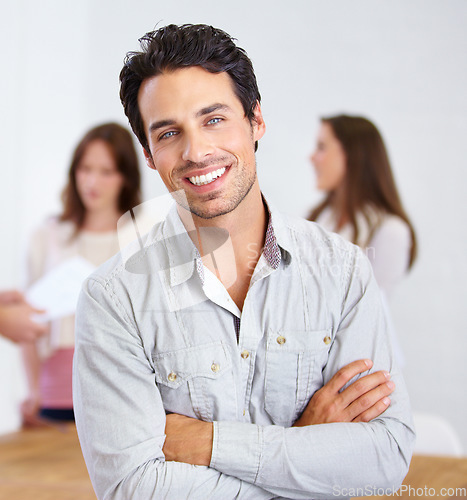 Image of Portrait, smile and business man with arms crossed in office, workplace or company. Face, confidence and happy male professional, entrepreneur or person with pride for career, job and success mindset