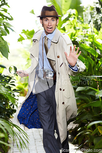 Image of Detective man, shocked search and portrait in jungle with vintage gear for investigation and solution. Outdoor, private investigator and spy with comedy for surveillance and retro reporter character