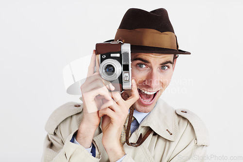 Image of Camera, photographer and surprise with portrait of man for surveillance, reporter and investigation. Retro, press and wow with agent on white background for vintage, paparazzi and journalist