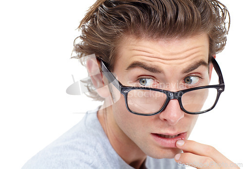 Image of Surprised, glasses and man in shock or anxiety, worried face and isolated closeup on white studio background. Omg, wow or wtf and nerd looking confused with doubt, fear or worry, stress or shock