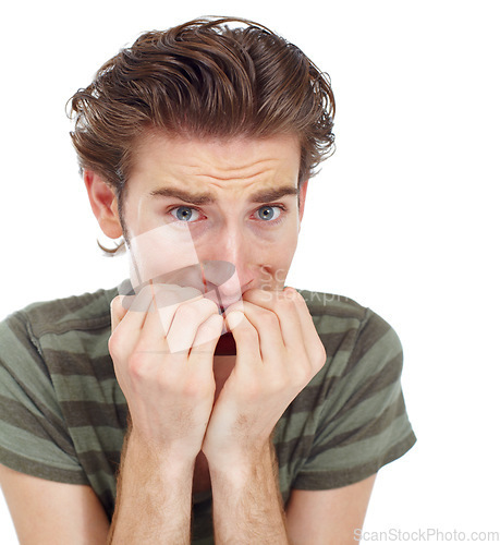 Image of Man, nervous and biting nails in studio portrait for mental health, fear or worry by white background. Male student, young guy or scared with stress, anxiety or problem with mistake, confused or fail