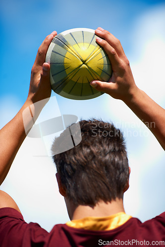 Image of Sports, rugby and man with a ball in hands while thinking or planning strategy. Headshot of male athlete person playing outdoor in sport competition, game or training for fitness, workout or exercise