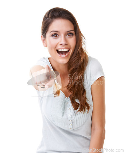 Image of Laugh, bullying and woman pointing in studio isolated on white background for humor, shame and mock. Body language, mean and portrait of girl point finger for comedy, reaction and laughing at joke