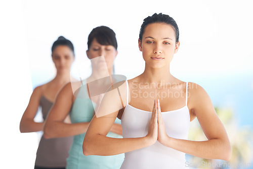 Image of Peace, meditation and young woman with zen and yoga exercise outdoor with a pilates instructor. Spiritual, namaste and wellness of training, workout and fitness group feeling calm from meditating