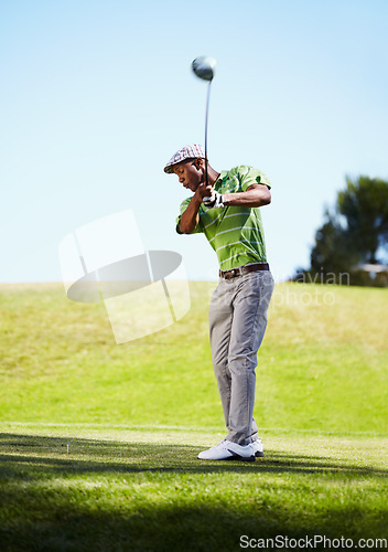 Image of Sports, golf swing and black man with stroke in game, match and competition on golfing course. Recreation, hobby and male athlete with club driver on grass for training, fitness and golfer practice