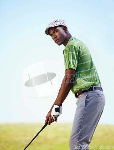 Image of Sports, golf and black man focus for stroke in game, match and competition on golfing course. Recreation, hobby and male athlete ready with club driver on grass for training, fitness and practice