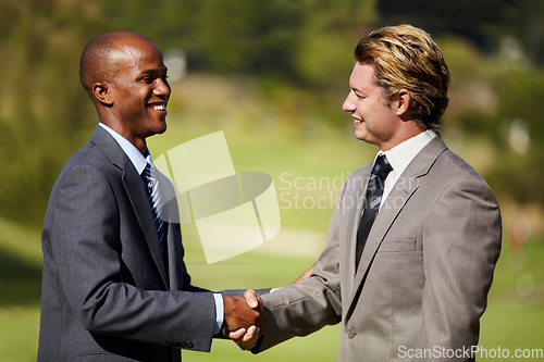 Image of Happy business men, shaking hands and outdoor for agreement, welcome or teamwork in diversity. Businessman, hand shake and smile in collaboration, deal or excited for partnership meeting or thank you