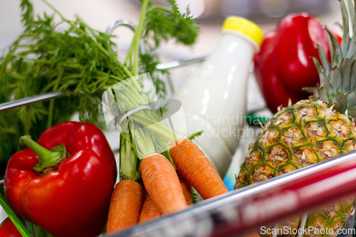 Image of Food, supermarket and health with grocery in shopping cart for sale, retail and product inflation. Diet, nutrition and economy with fruit produce in store trolley for purchase, consumer and spending