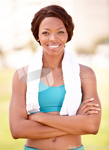 Image of Fitness, black woman and portrait with arms crossed from exercise and sport. Workout, African person smile and female face feeling healthy and happy from sports training and wellness empowerment