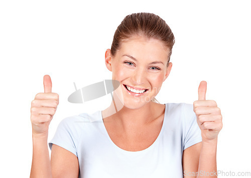 Image of Happy woman, portrait smile and thumbs up for winning, success or good job against a white studio background. Female person smiling showing thumb emoji, yes sign or like for approval or agreement