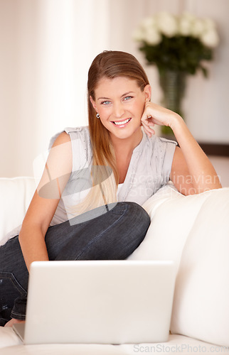 Image of Relax, laptop and portrait with woman sofa in living room for social media, streaming and website. Search, technology and digital with female user typing at home for connection, email and internet