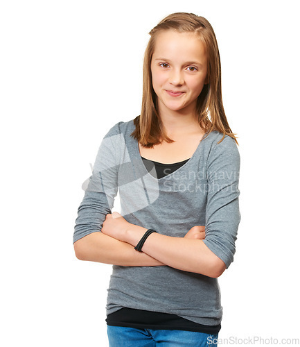 Image of Teenager, girl and portrait smile with arms crossed standing isolated against a white studio background. Young female teen person or model smiling and posing in confidence with casual clothing
