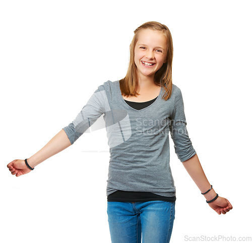 Image of Studio, portrait and a happy teenage girl for fashion or carefree or pose and standing against a white background. Style, face and young kid smile or child model confident in jeans and shirt