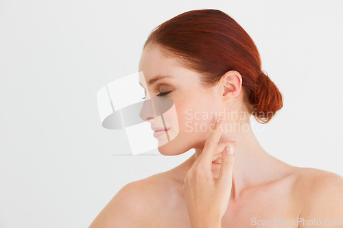 Image of Beauty, eyes closed and woman touch face in white background, isolated studio mockup and natural skincare. Female model, facial glow and makeup cosmetics for aesthetic dermatology, self love or shine