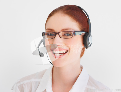 Image of Call center, happy and portrait of woman in studio for telemarketing, customer service and help desk. Smile, communication and contact us with face of consultant on white background for mockup
