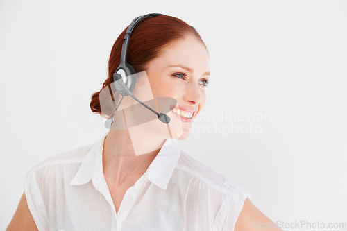 Image of Call center, smile and consulting with woman in studio for telemarketing, customer service and help desk. Happy, communication and contact us with consultant isolated on white background for mockup