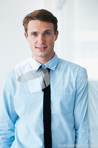 Image of Portrait, businessman and smile in office with pride for career, job or occupation. Professional, entrepreneur and male executive or person from Australia with confidence, proud and success mindset.