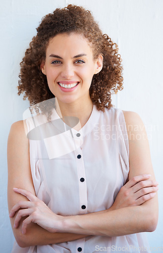 Image of Portrait, business woman and arms crossed in office with pride for career, job or occupation. Professional, entrepreneur and female designer or person from Australia with confidence and happiness.