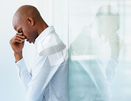 Image of Business stress, headache and black man in office with crisis, problem or fail on mockup. Sad, depression and male person with fatigue, tired or burnout, anxiety and mental health in workplace.