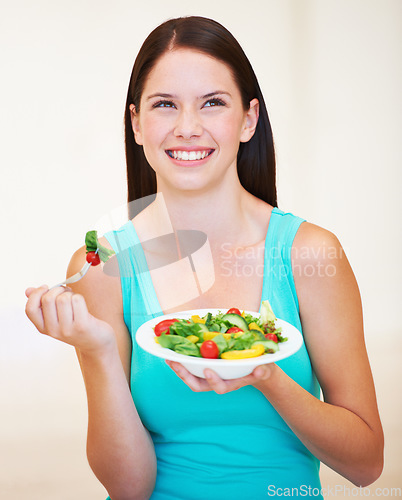 Image of Woman, thinking and salad or healthy food with vegetables, nutrition and health benefits. Face of a happy female person on a nutritionist diet and eating vegan for weight loss, wellness or detox idea