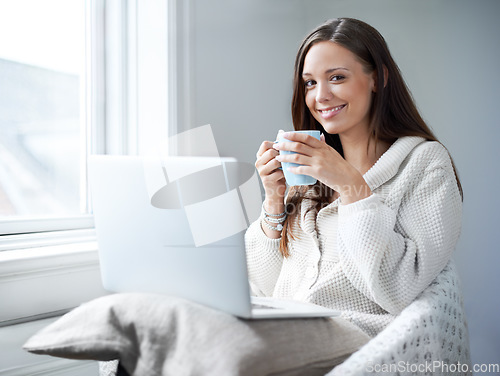 Image of Woman, coffee and happy in portrait with laptop, studying or social media in home office. Girl, student and computer with tea cup, relax and happiness for learning, education or future with smile