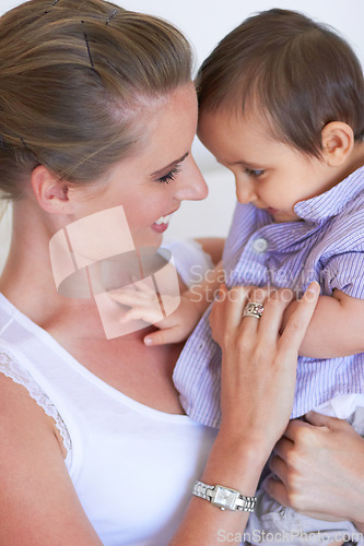 Image of Love, affection and happy family mother with baby care, motherhood and bonding with youth kid. Child development, happiness and young toddler with mom, mama or woman smile for young infant