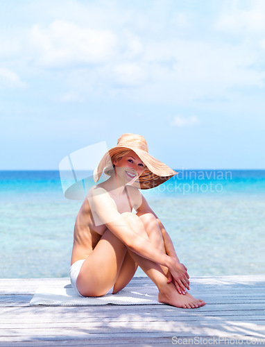Image of Travel, topless and portrait of woman at beach for sunbathing, summer break and freedom in Bali. Sexy, blue sky and tropical with girl in bikini on vacation for mockup, peace and happy on trip