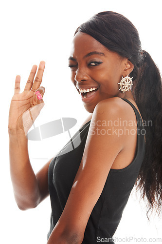 Image of Ok, smile and wink with portrait of black woman in studio for happiness, cute and confidence. Cool, agreement and yes face of happy female isolated on white background for okay emoji, hand or gesture