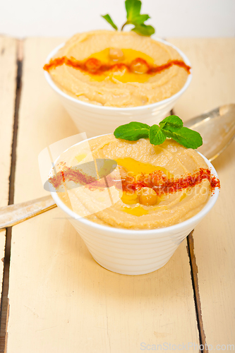 Image of Hummus with mint on top