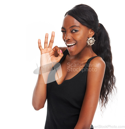 Image of Wink, okay and emoji with portrait of black woman for like, thank you or support. Success, yes and feedback with girl and hand gesture for agreement, vote and smile isolated on white background