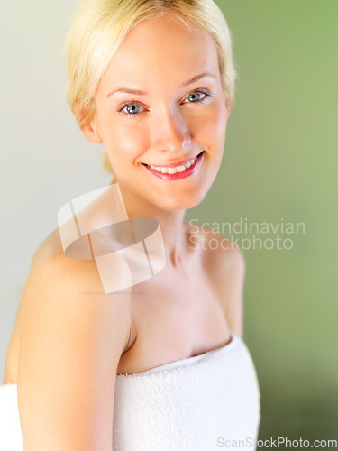 Image of Skincare, beauty and portrait of woman in bathroom for shower, cleaning and hygiene. Wellness, luxury and cosmetology with face of girl and towel for dermatology, cosmetics and facial at home