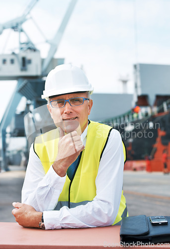 Image of Happy portrait, logistics and shipping man or manager smile on port with container, cargo or construction site. Manufacturing, supply chain or freight senior leader or person for industrial business