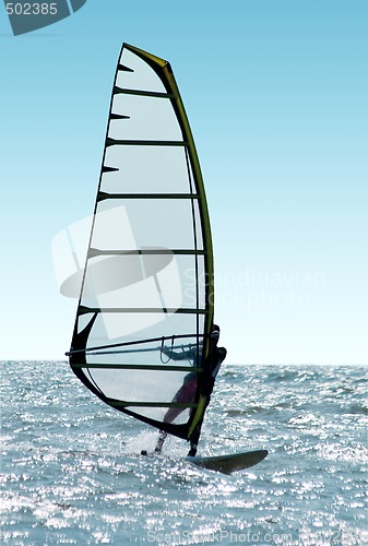 Image of Windsurfer on waves of a sea 