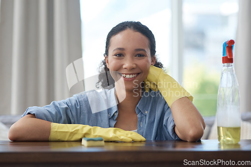 Image of Woman, cleaner and smile in portrait with spray bottle, detergent or chemical disinfectant for housekeeping. Spring cleaning, service and female housekeeper with smile, liquid soap and clean house