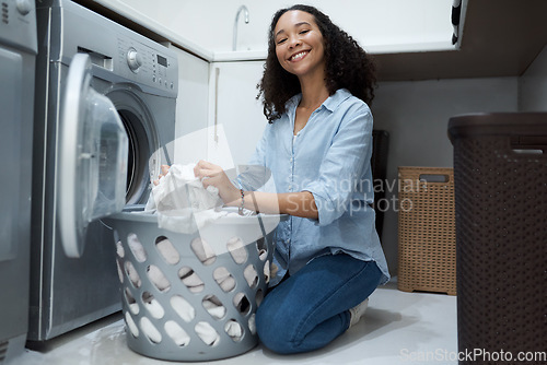 Image of Woman in portrait, laundry and washing machine, cleaner with basket and housekeeping, dryer and hygiene. Housekeeper service, female person smile with housework, cleaning clothes and appliance