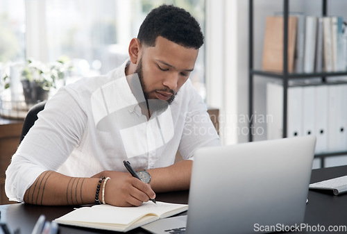 Image of Focus, writing notes and black businessman on laptop working in modern office or male manager or expert and planning. Management, corporate and professional on pc at workplace for market research