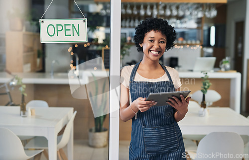 Image of Happy woman, tablet and portrait of waitress with open sign for communication, social media or online order at cafe. Female person or barista in small business with smile on technology at coffee shop