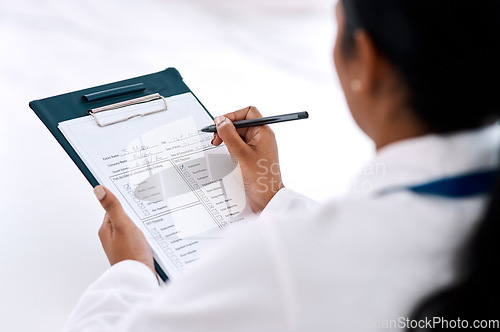 Image of Checklist, woman doctor with clipboard and pen at the hospital. Check mark or tick for correct, document or scan results of person and medical female writing notes or prescription on page or sheet