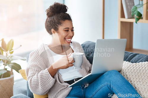 Image of Happy woman, laptop and coffee while laughing on home sofa for meme or funny video. Real female person relax on a couch with tea cup, internet connection and tech for streaming online on website