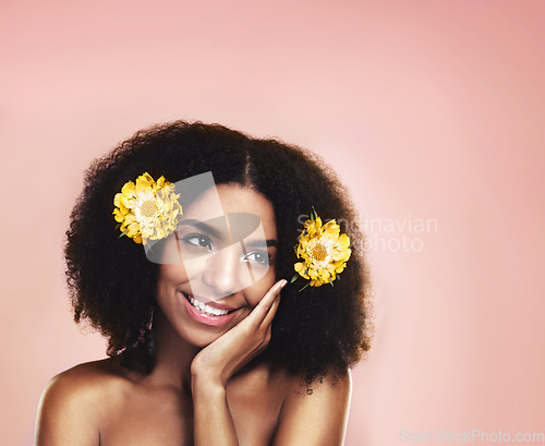 Image of Happy woman, thinking and flowers for hair care, beauty and studio background with mockup of natural skincare. Face, african model and daydream with floral plants, afro and sustainable cosmetic ideas